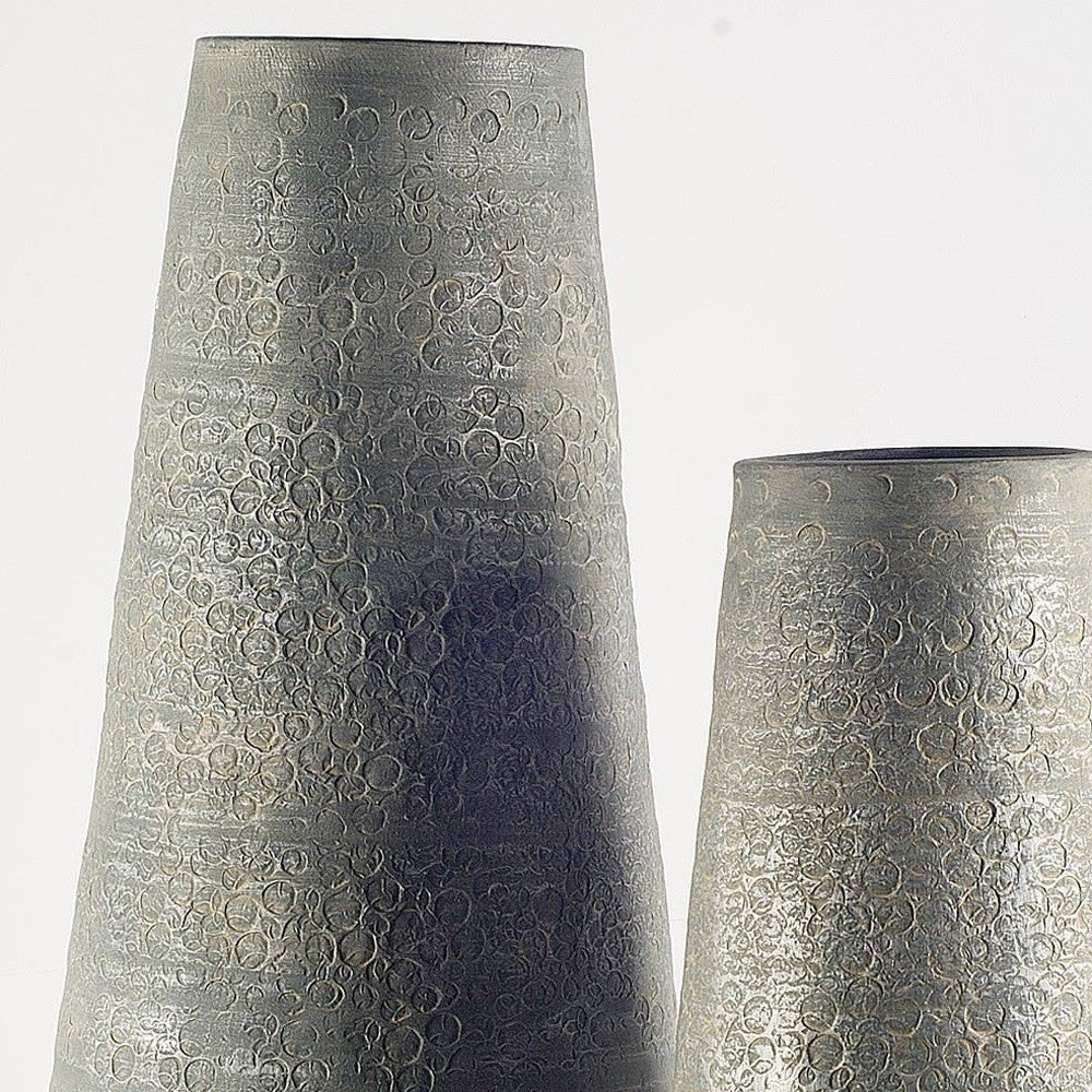 Gold textured ceramic floor vase with rustic gray finish and hammered pattern.