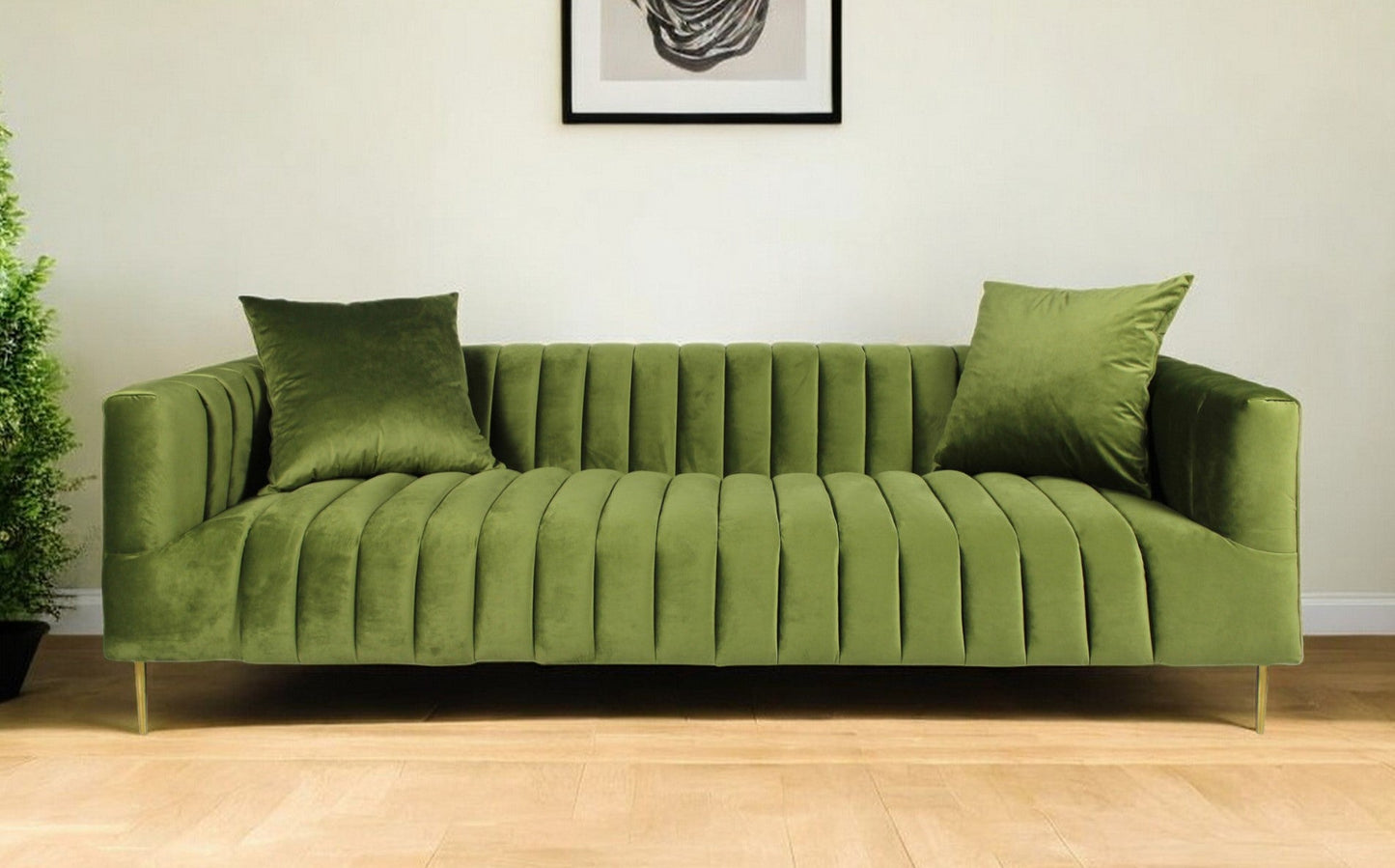 90" olive green velvet sofa with gold legs and toss pillows