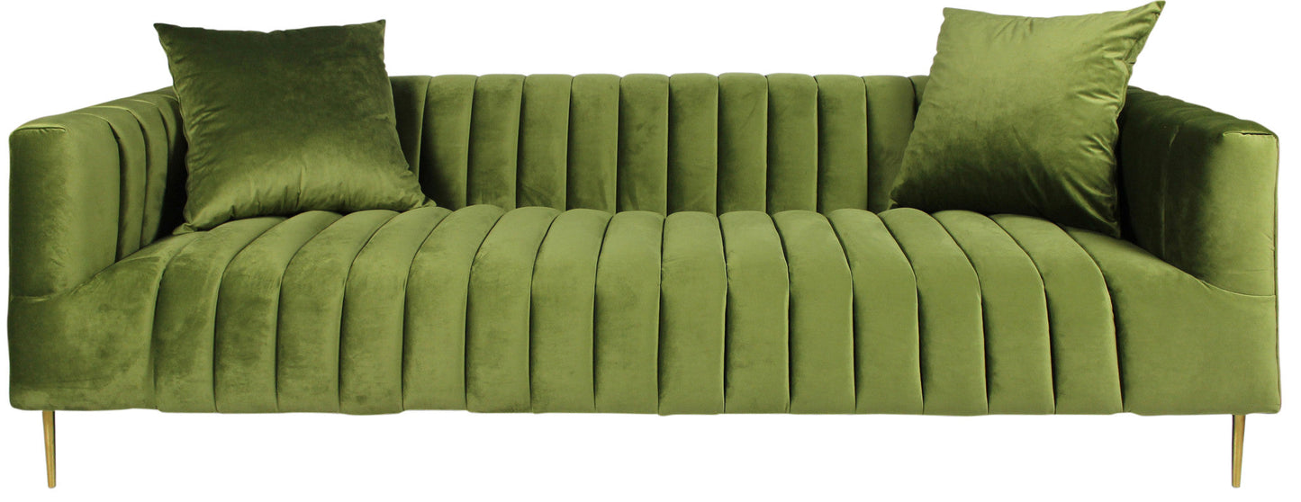 90" olive green velvet sofa with gold legs and toss pillows.