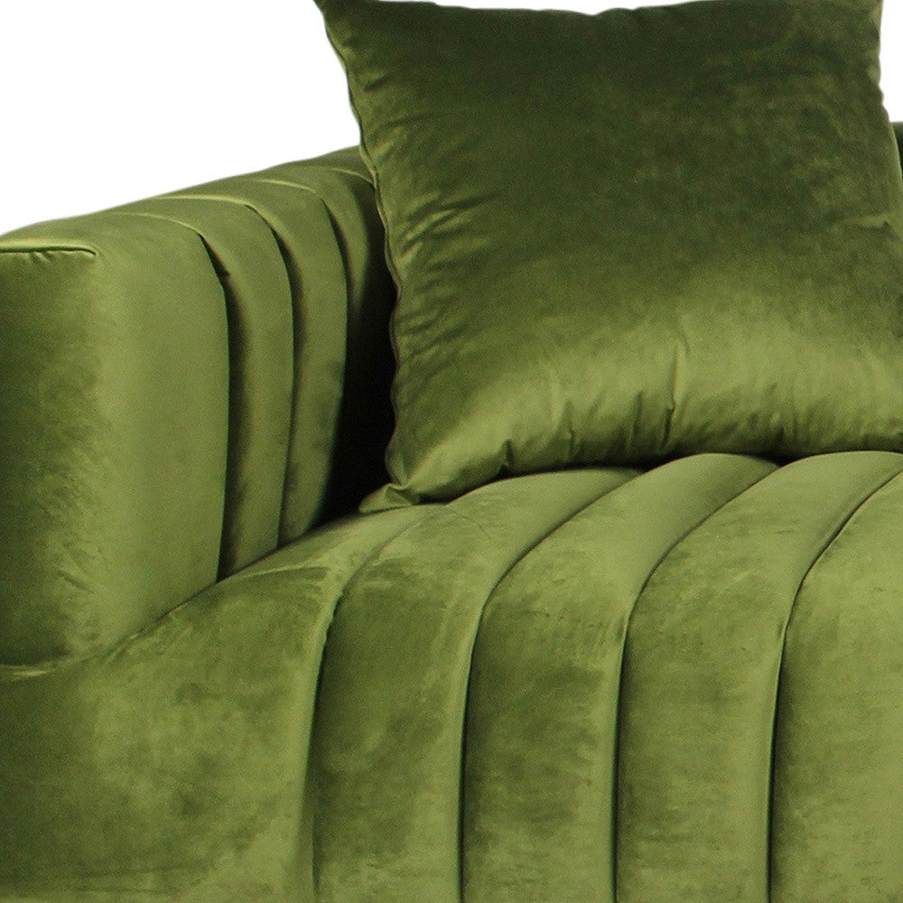 90" olive green velvet sofa with gold legs and toss pillows