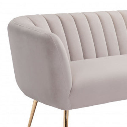 70" beige velvet sofa with gold legs, tufted back design, contemporary style.