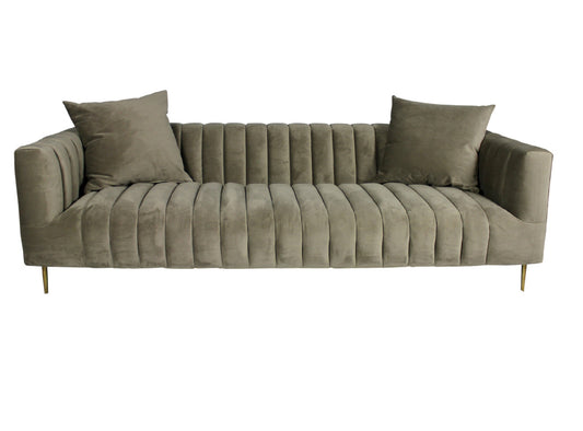 90" gray brown velvet sofa with gold legs and toss pillows.