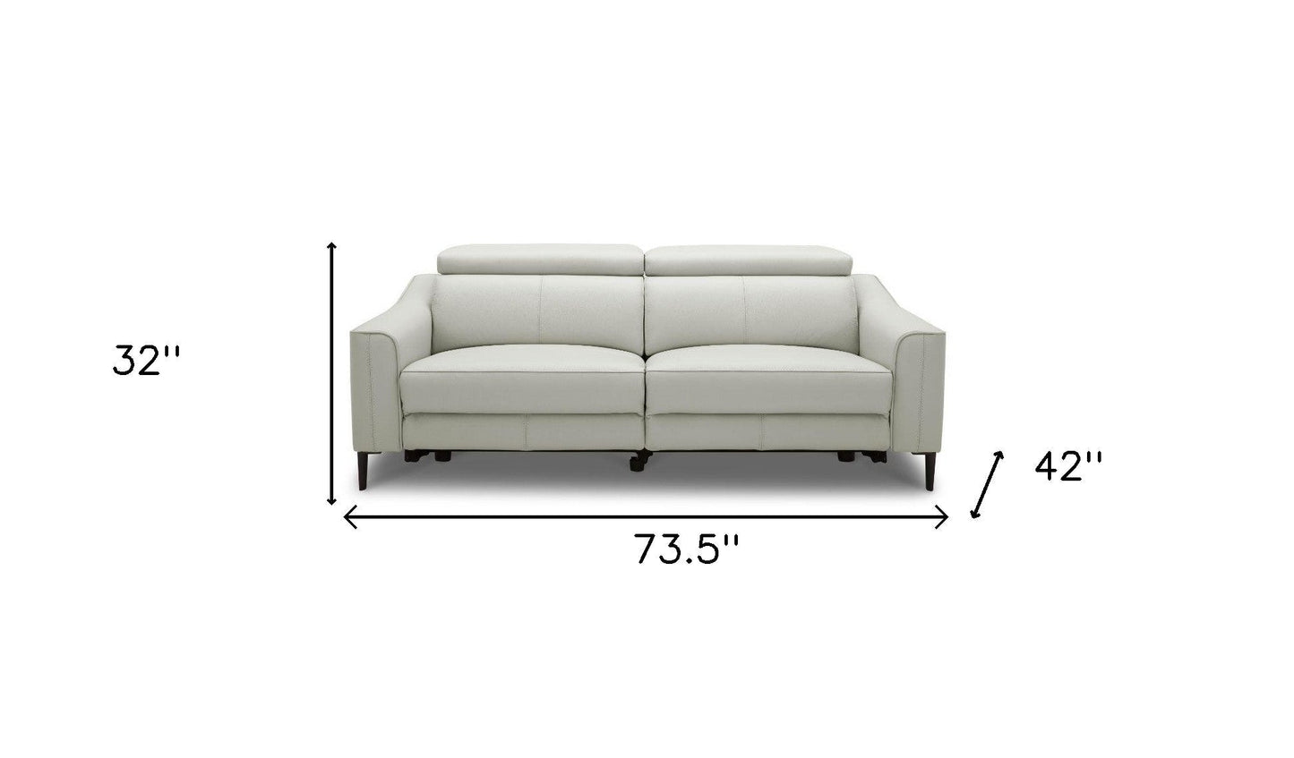 74" gray leather reclining sofa with black legs, high-grade leather, contemporary design, power reclining feature.