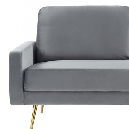 72" gray velvet sofa with brass legs and pillow back design