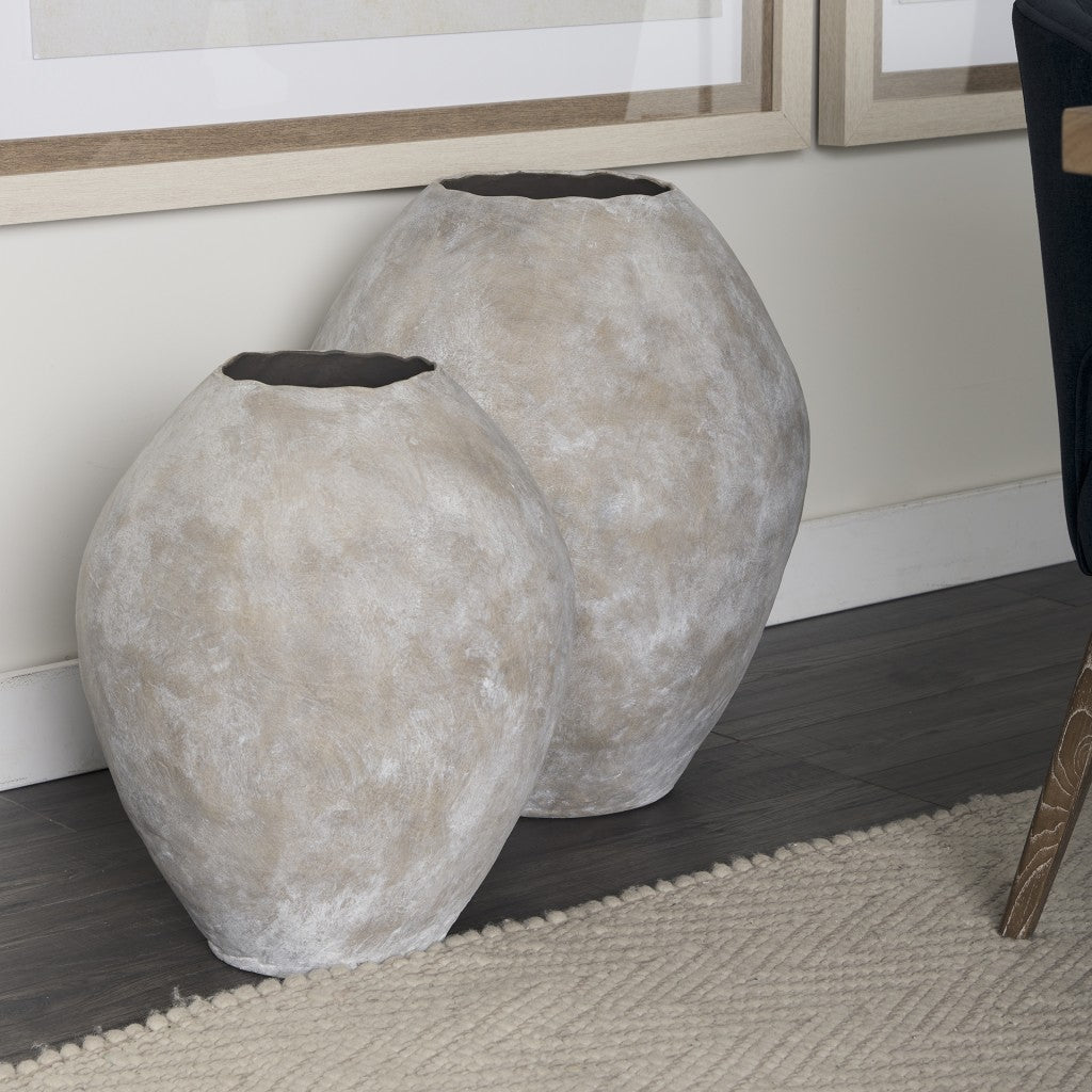 Kyros Natural Wash 28" Earthy Ceramic Oval Vase with beige and tan tones in living room setting.