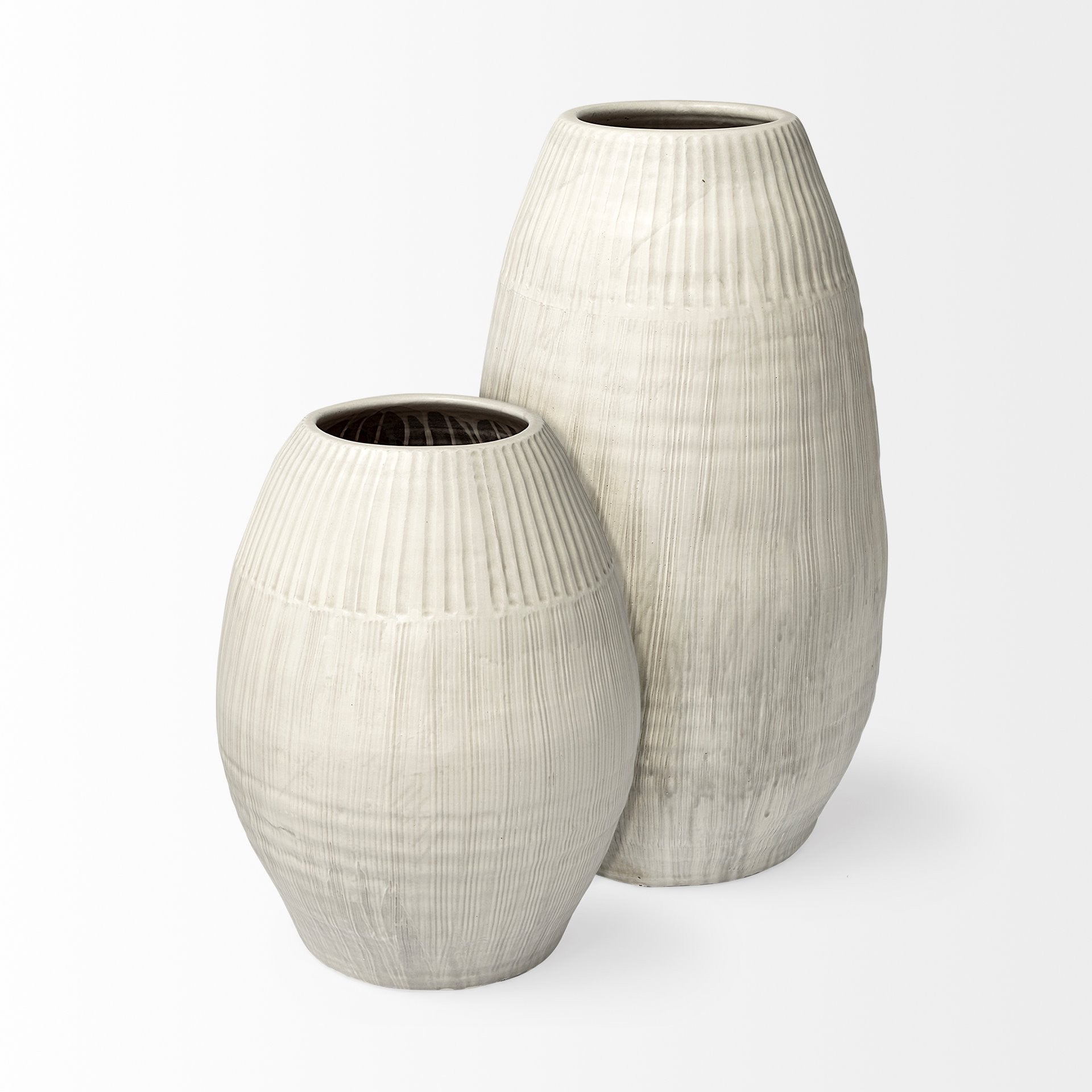 White embossed stripes ceramic vase with matte finish and textured design, perfect for floral displays.