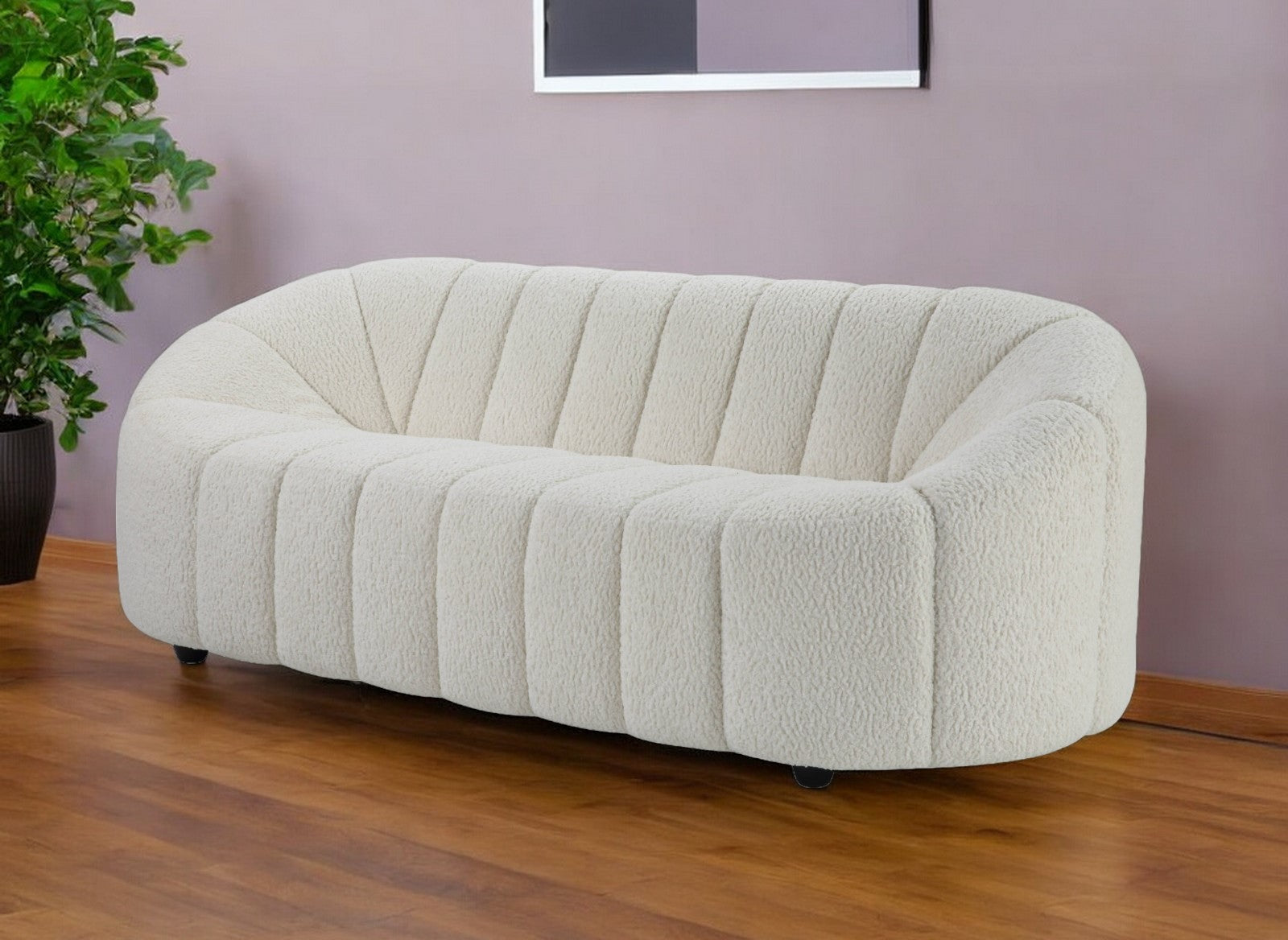 84" white sherpa sofa with black legs, modern design, cozy upholstery.