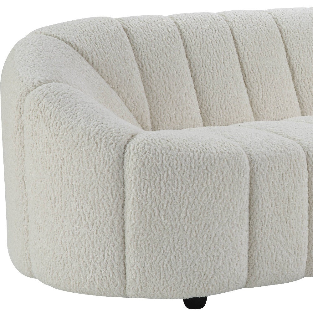 84-inch white sherpa sofa with black legs, modern design, cozy upholstery.